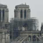 A picture taken on April 16, 2019 shows Notre-Dame-de-Paris in the aftermath of a fire that devastated the cathedral. - Paris was struck in its very heart as flames devoured the roof of Notre-Dame, the medieval cathedral made famous by Victor Hugo, its two massive towers flanked with gargoyles instantly recognisable even by people who have never visited the city. (Photo by Bertrand GUAY / AFP)
